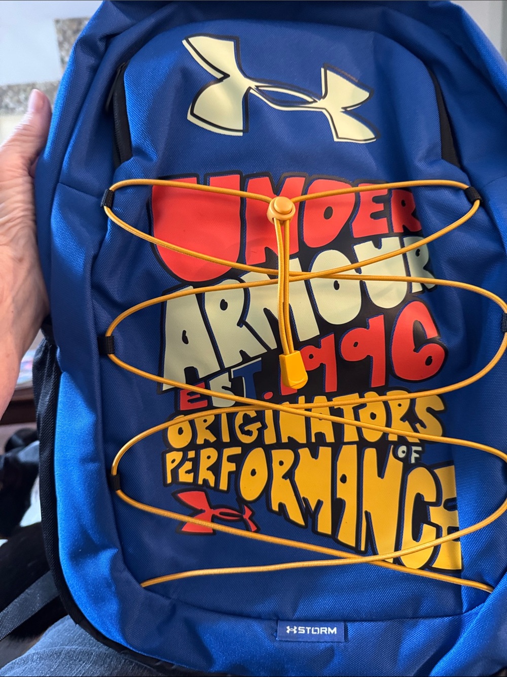 Under Armour Blue Backpack with Yellow Bungee and Red Graphic.  NWT